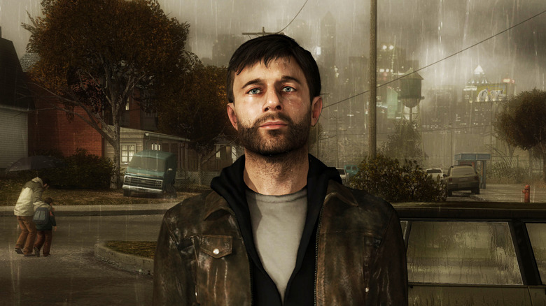 Ethan Mars stands morosely in a downpour in a neighborhood in "Heavy Rain" (2010)