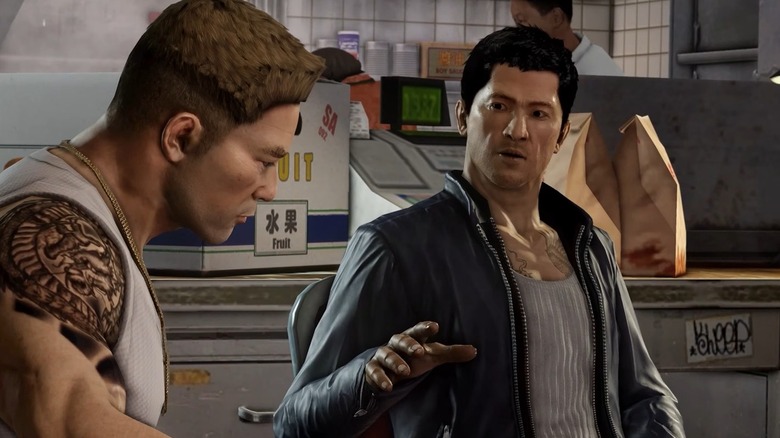 Protagonist Wei Shen sitting with Winston in Sleeping Dogs