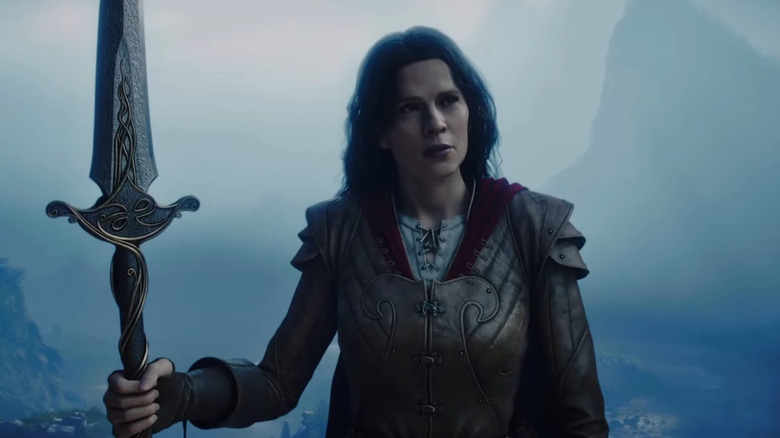 Isabel holds up a sword in Fable (2027)