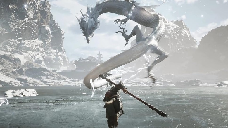The Destined One charges at a water dragon in Black Myth: Wukong