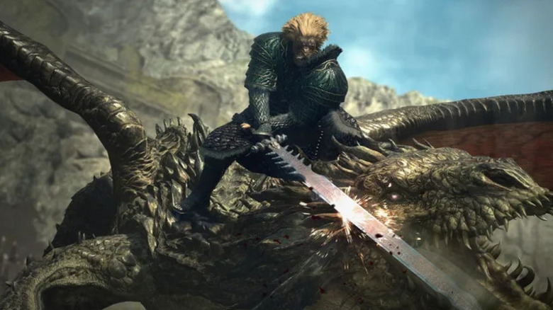 A warrior strikes a dragon in the face with a sword in Dragon's Dogma II