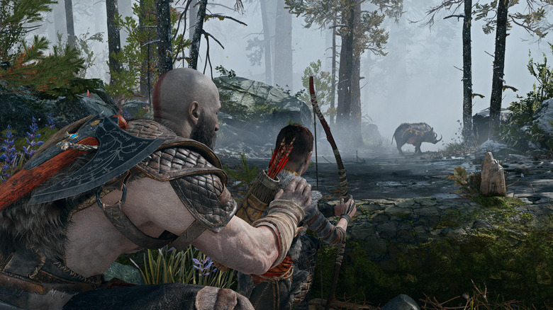Kratos and Atreus hunting a boar with a bow and arrow