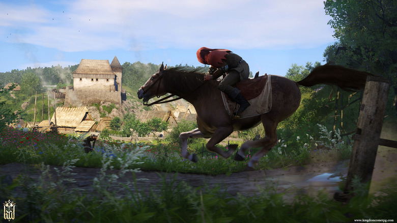 Henry rides a horse through a flower field in Kingdom Come: Deliverance