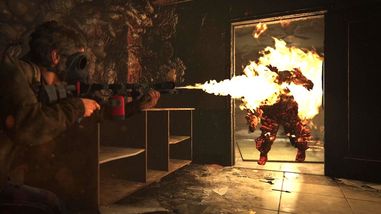 Joel Miller flamethrowers a clicker in The Last of Us