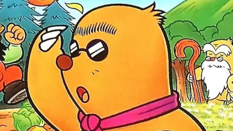 A mole surveys the horizon on the cover art for Mole Mania