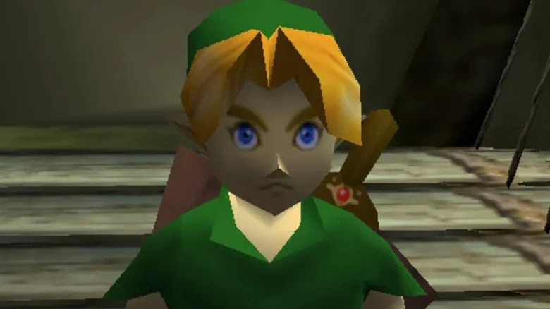 Link stands on a wooden bridge in The Legend of Zelda: Ocarina of Time