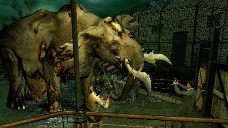 Survivors aim at a zombified elephant in Resident Evil Outbreak
