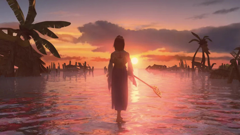 Yuna walks on water looking at a sunset in Final Fantasy X