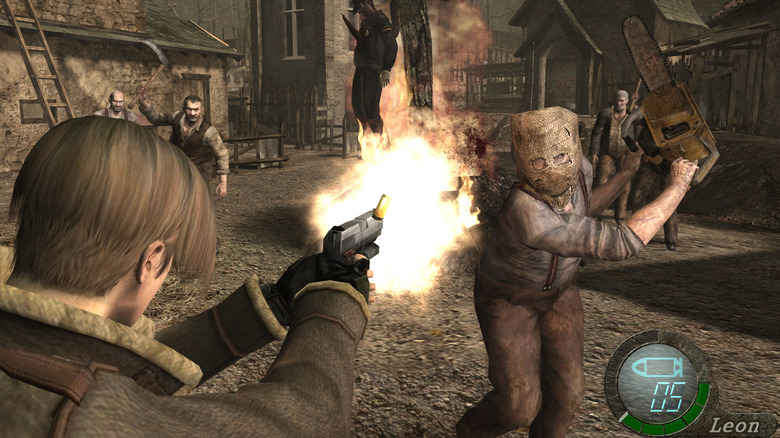 Leon S. Kennedy aims at a villager wielding a chainsaw in Resident Evil 4 (2005)