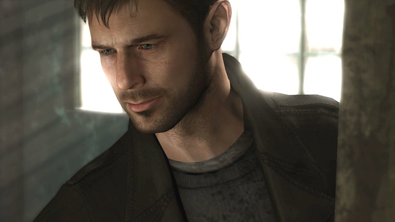 Ethan Mars looks down intensely in Heavy Rain