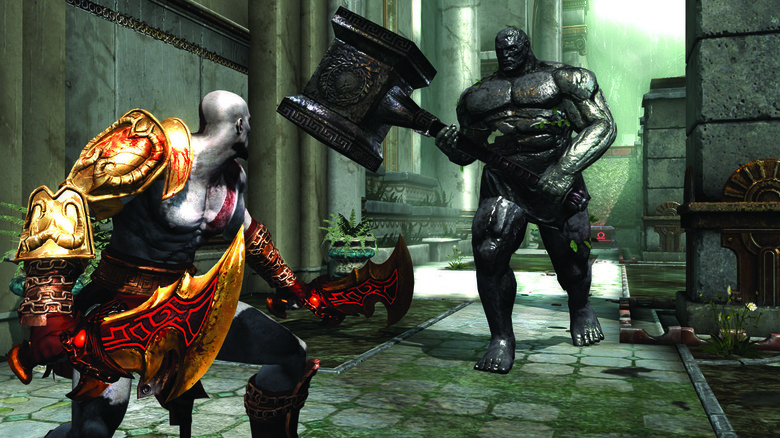 Kratos faces an approaching golem in God of War III