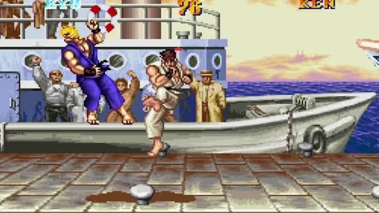 Ryu tornado kicks Ken on the docks in Street Fighter II Turbo