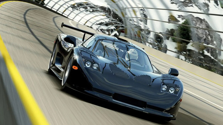 A driver roads a corner on race track in Forza Motorsport 4