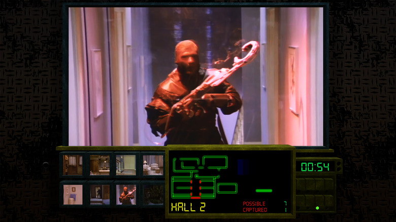 A masked figure with a strange contraption walks into a bathroom in Night Trap