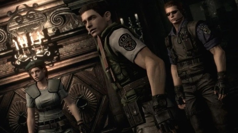 Jill Valentine, Chris Redfield, and Albert Wesker stand together in a foyer in Resident Evil (2002)