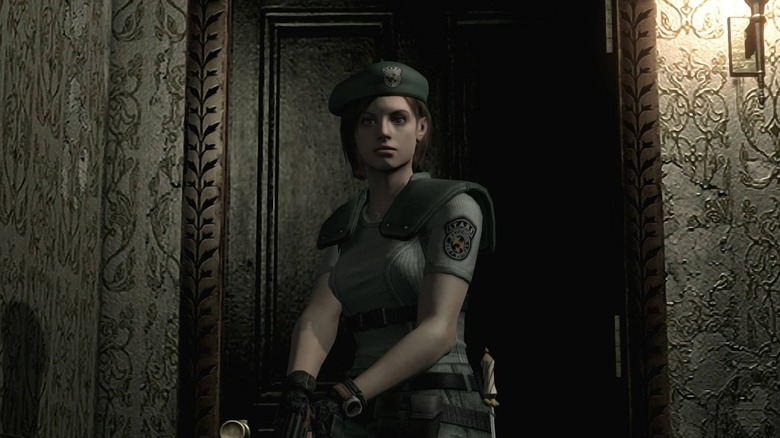 Jill Valentine stands in front of a door in "Resident Evil" (2002)
