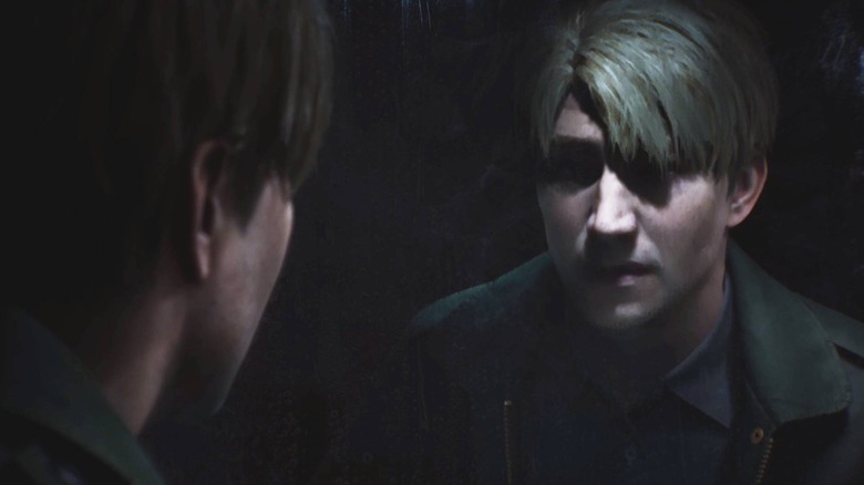 James Sunderland stares at his reflection in "Silent Hill 2" (2024)