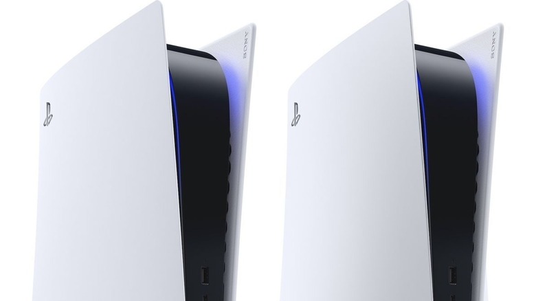 Two PlayStation 5s sit next to each other