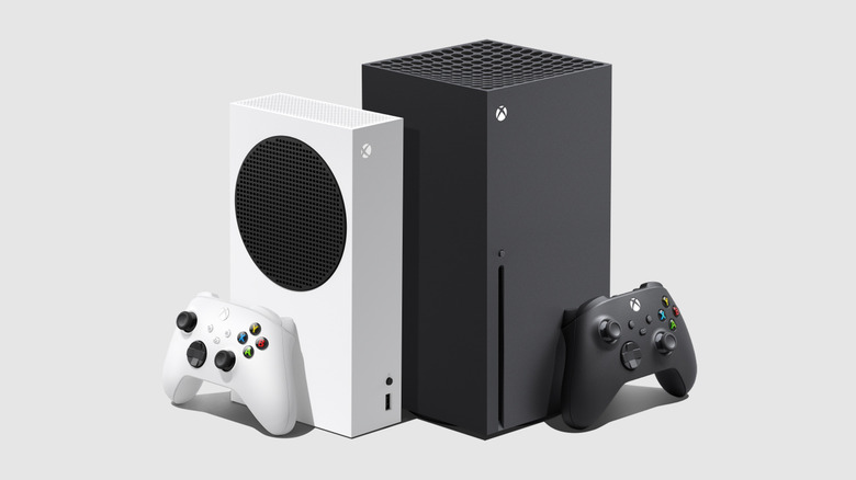 An Xbox Series S sits next to an Xbox Series X