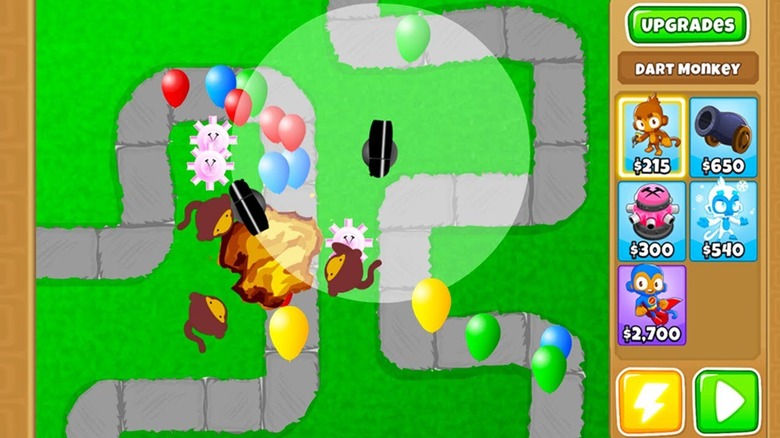 Balloons moving past towers in Bloons TD