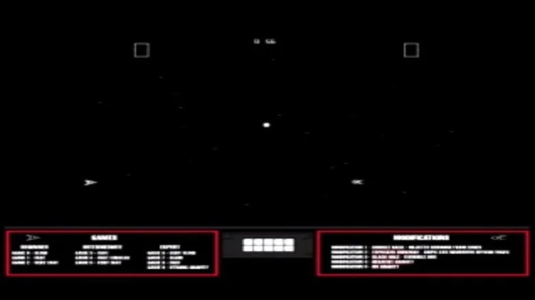 Two spaceships approach each other with a sun in the middle of the screen in "Space Wars" (1977)