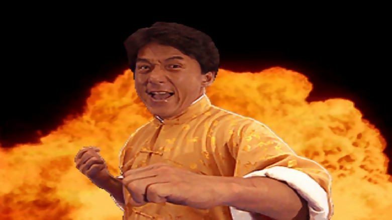 Jackie Chan yells in front of a fiery background in "Jackie Chan in Fists of Fire" (1995)