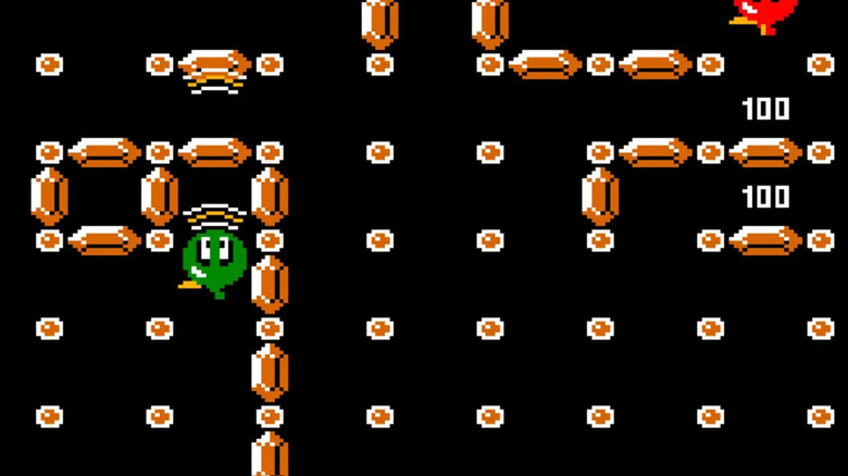 A green Bubbles moves around poles grabbing gold in "Clu Clu Land" (1984)
