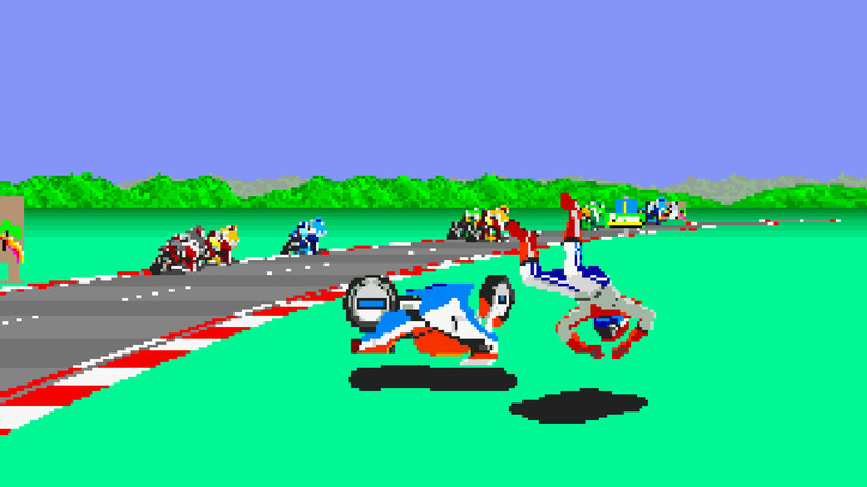 The player character tumbles from his motorcycle in the grass by the road in "Hang-On" (1985)
