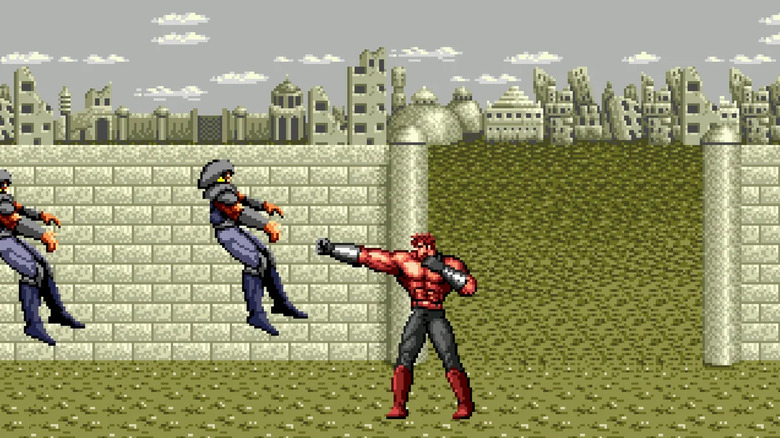Aarzak punches two helmeted troops in a post-apocalyptic wasteland in "Last Battle" (1989)