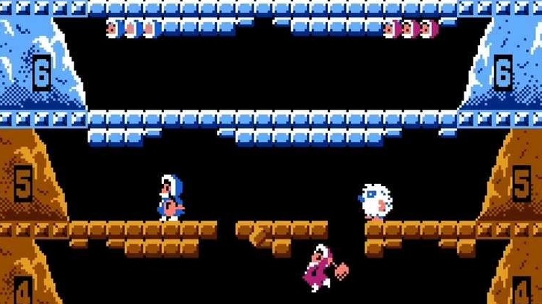 Nana and Popo leap up a level, with a yeti behind them, in "Ice Climber" (1985)