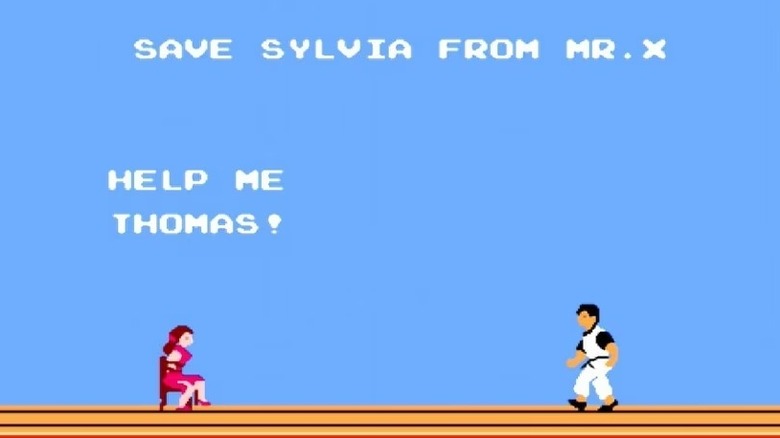 Sylvia, tied to a chair, asks Thomas for help as he approaches in "Kung Fu" (1984)
