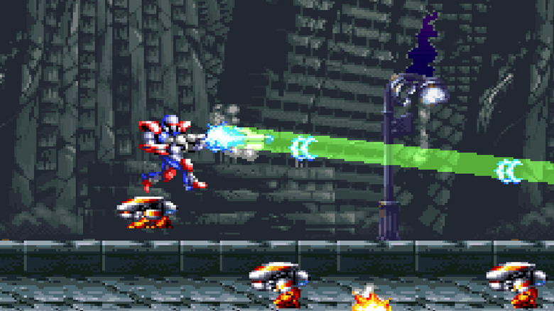 The player character fires a large green beam while jumping over robots in Super Turrican 2