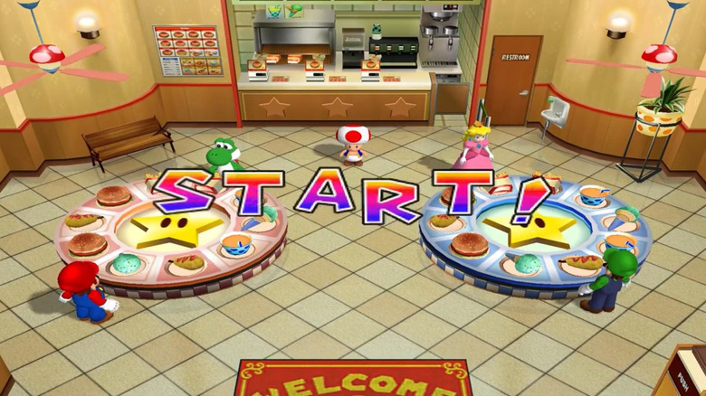 Mario, Yoshi, Peach, and Luigi stand by tables full of food in Mario Party 4