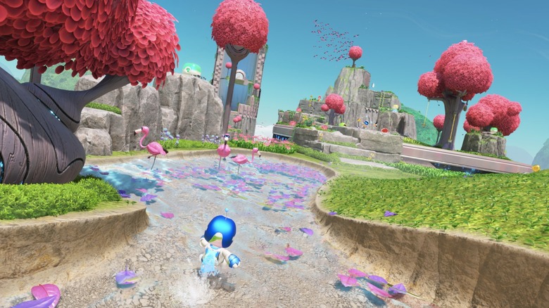 Astro running toward flamingoes in Astro Bot (2024)