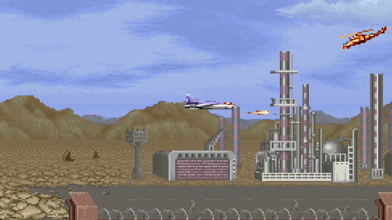 A fighter jet engages a helicopter by an oil refinery in U.N. Squadron