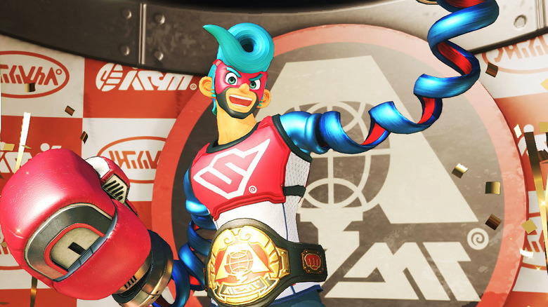 Spring Man smiles defiantly while stretching out his left arm in "Arms" (2017)