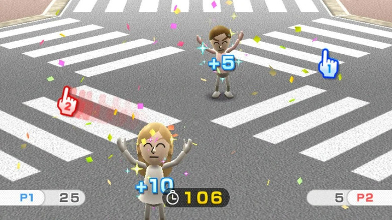 Two Miis celebrate on a crosswalk in Wii Play