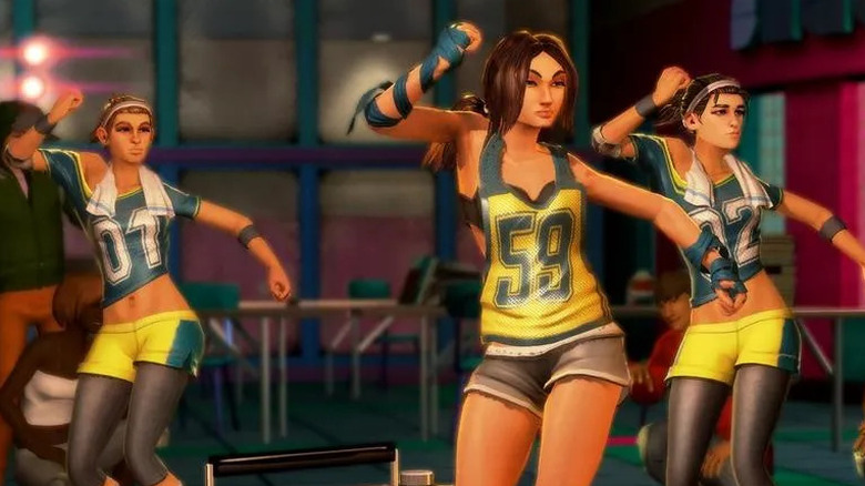 Three women dance together in Dance Central
