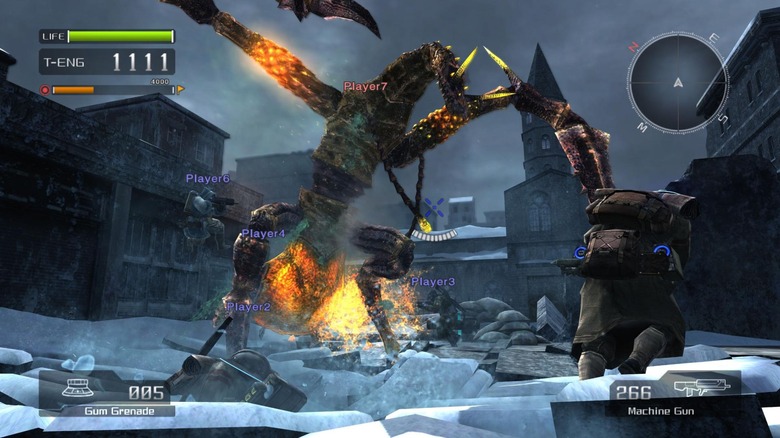 A group of players run around a towering monster in a city square in Lost Planet: Extreme Condition