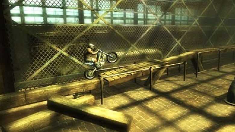 A motorcycle moves towards a railing in Trials HD