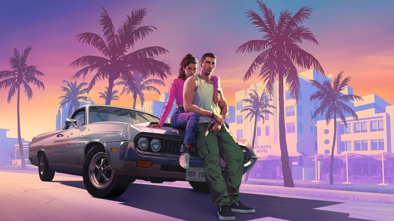 Jason Duval and Lucia Caminos sit on the hood of a supercharged muscle car parked on a tropical street on the cover of "Grand Theft Auto VI"
