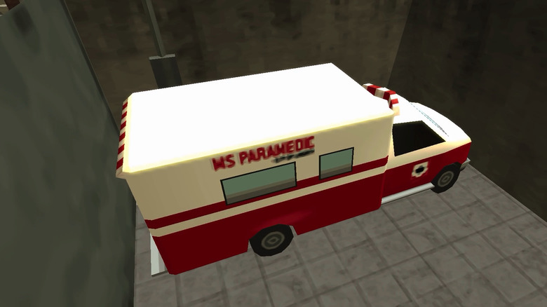 Am ambulance sits in a bare garage in Grand Theft Auto Chinatown Wars