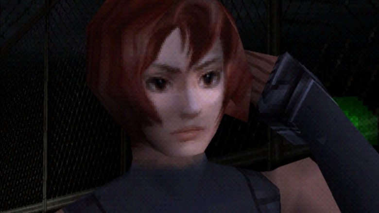 Regina holding her hand to her ear in Dino Crisis
