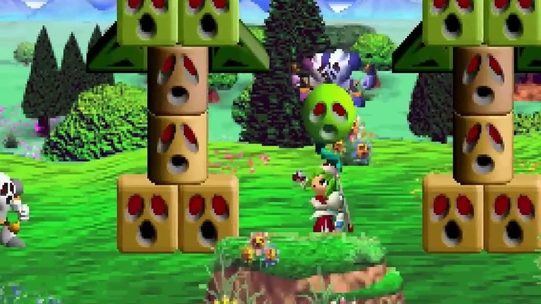 Marina stares up in a grassy field in Mischief Makers