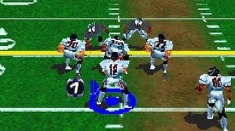 A group of football players line up at the line of scrimmage in "NFL Blitz 2000" (2000)