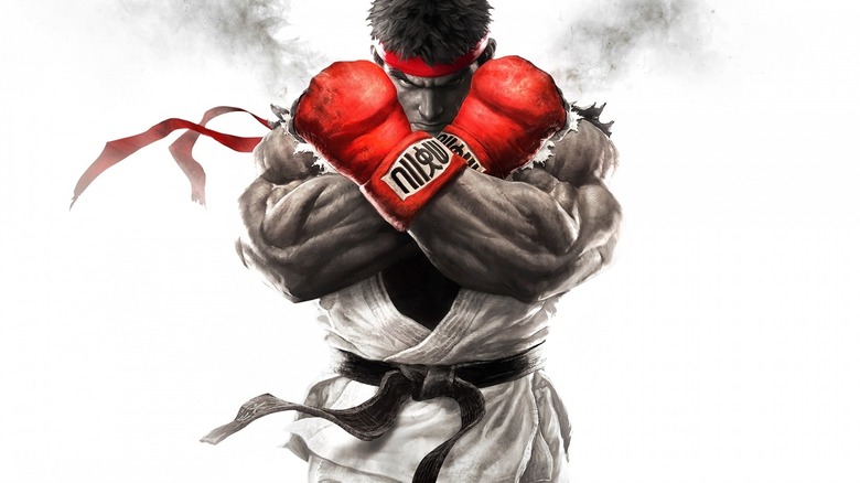 Ryu crosses his arms on the cover art for Street Fighter V