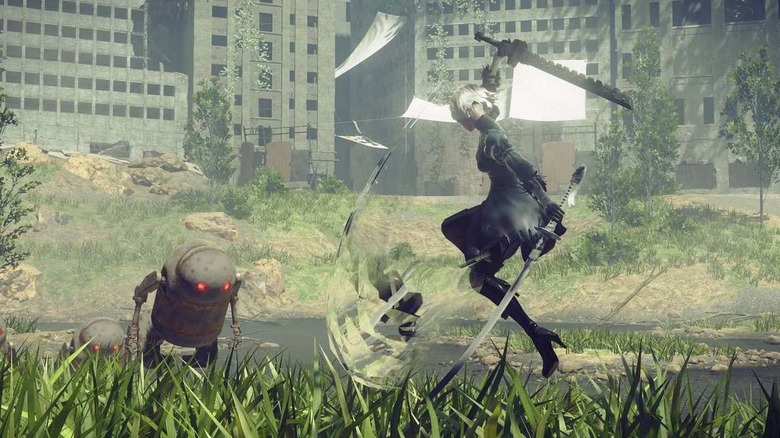 2B attacks an enemy in Nier: Automata
