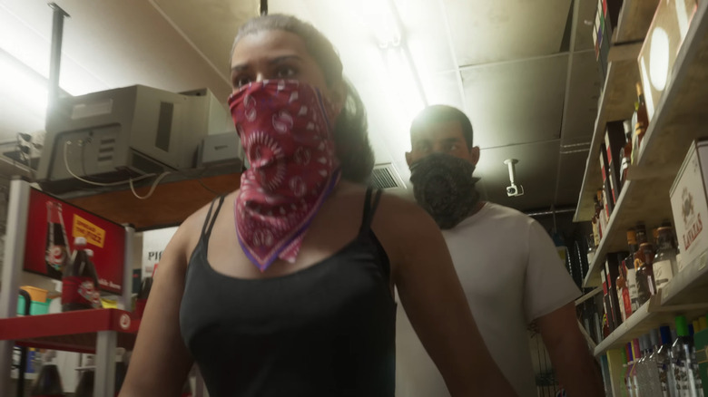 Lucia and Jason getting ready to rob a liquor store in Grand Theft Auto