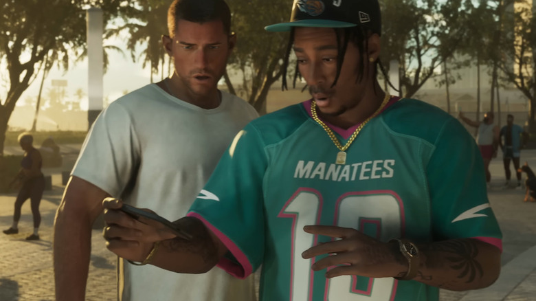 Jason and Dre'Quan Priest looking at his cellphone in Grand Theft Auto VI