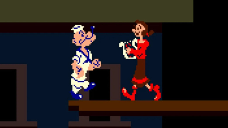 Popeye walks up to Olive Oyl in "Popeye" (1982)